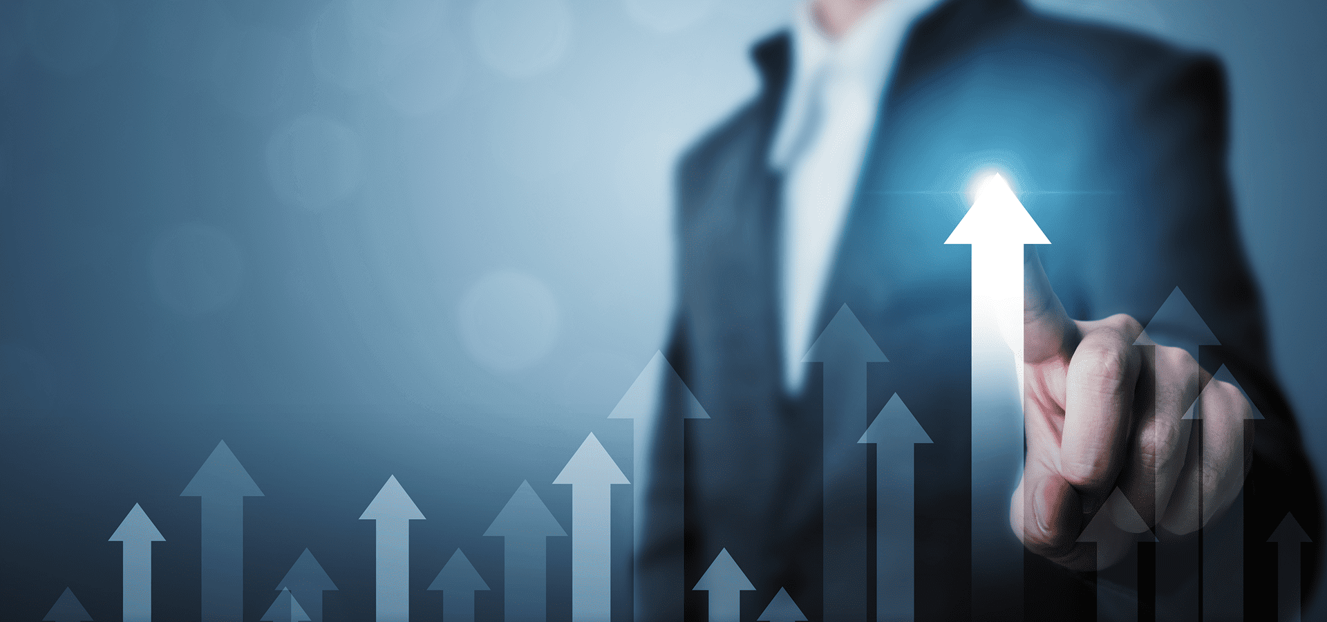 Businessman with upward arrows symbolizing growth and success.
