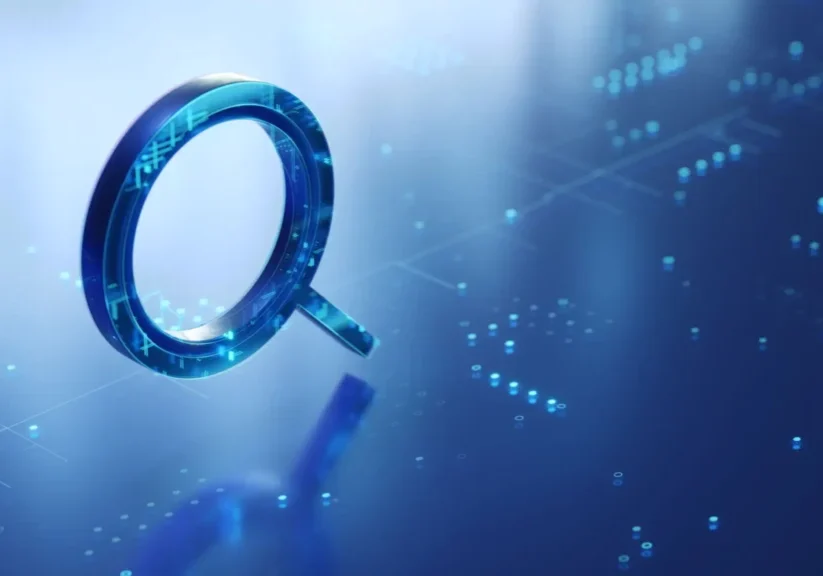 Digital magnifying glass over a data-filled background.